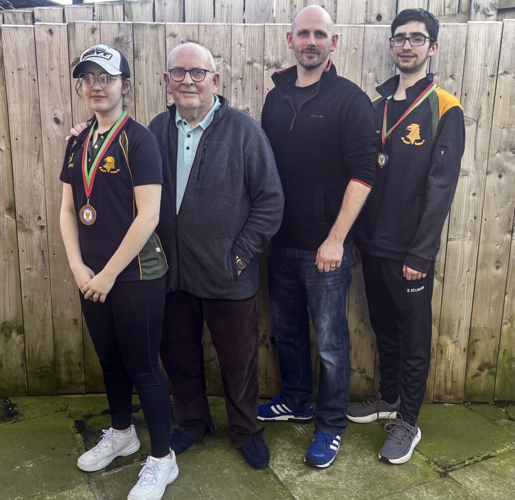 Three generations of archers, 
L-R:Jessica, Jack (father), Darrel and Jake