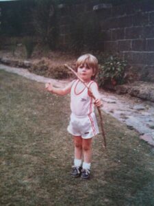 Darrel Wilson, age 3, with his first bow/stick, given to him by his father, Jack. 